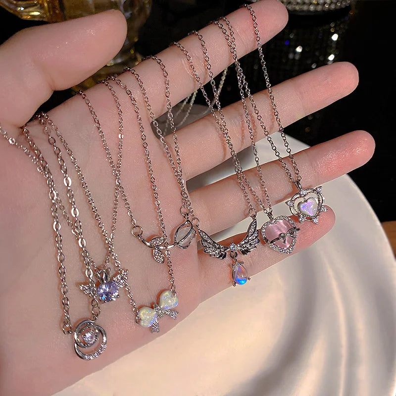 Crystal Bow, Angel Wings & Heart Necklace
