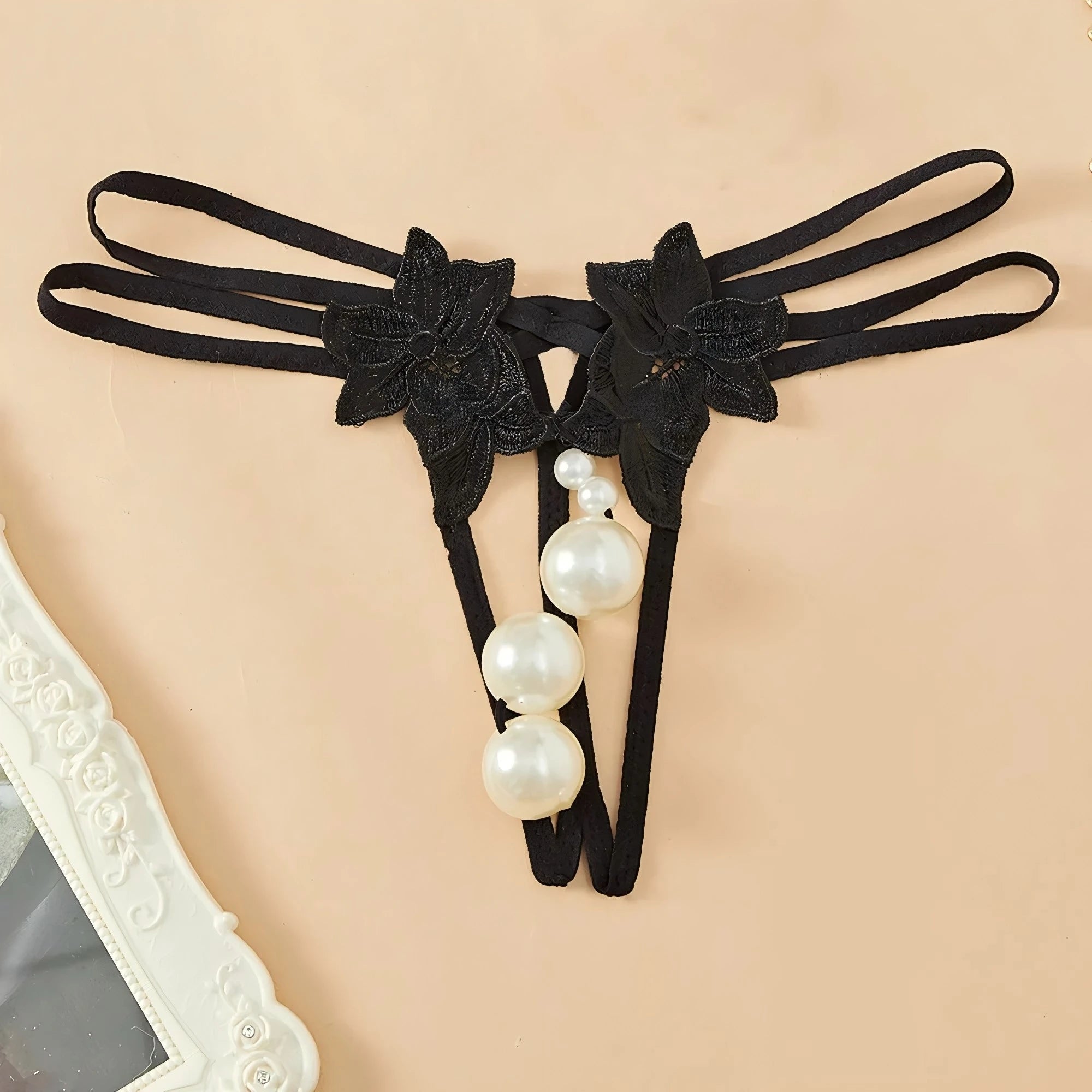 Lingerie with beads; enticing thong; single-row massage lingerie; sexy open-crotch lingerie; novelty lingerie.