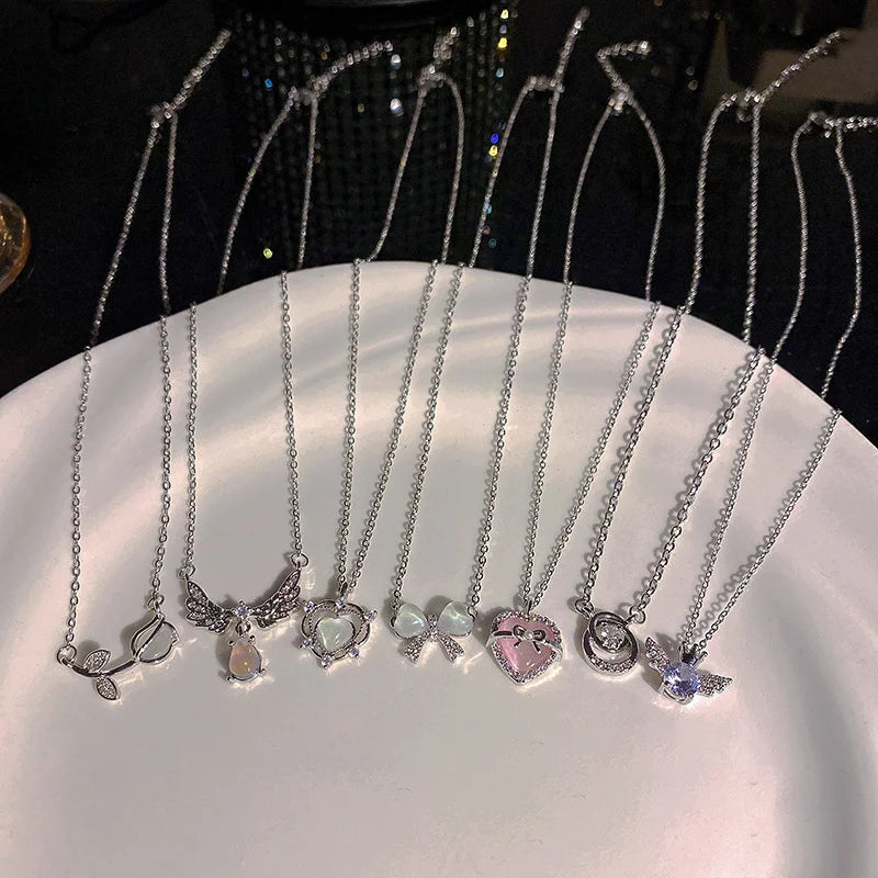 Crystal Bow, Angel Wings & Heart Necklace