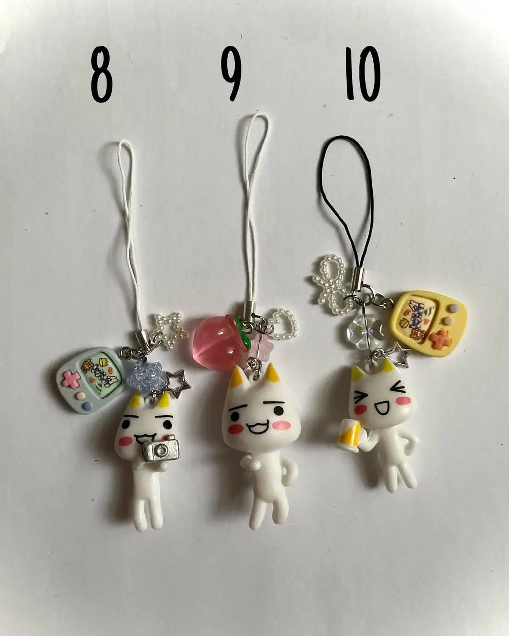 toro inoue phone charms