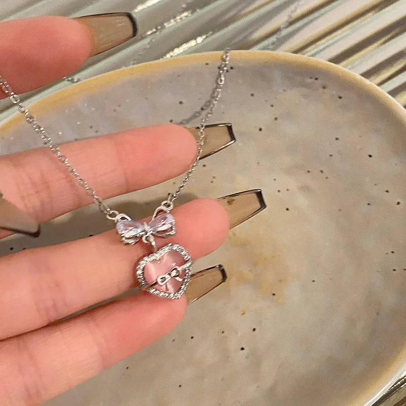 Crystal Bow, Angel Wings & Heart Necklace