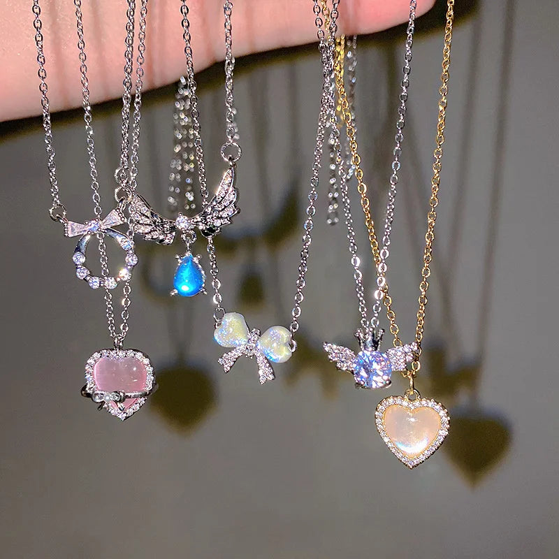 Crystal Bow, Angel Wings & Heart Necklace