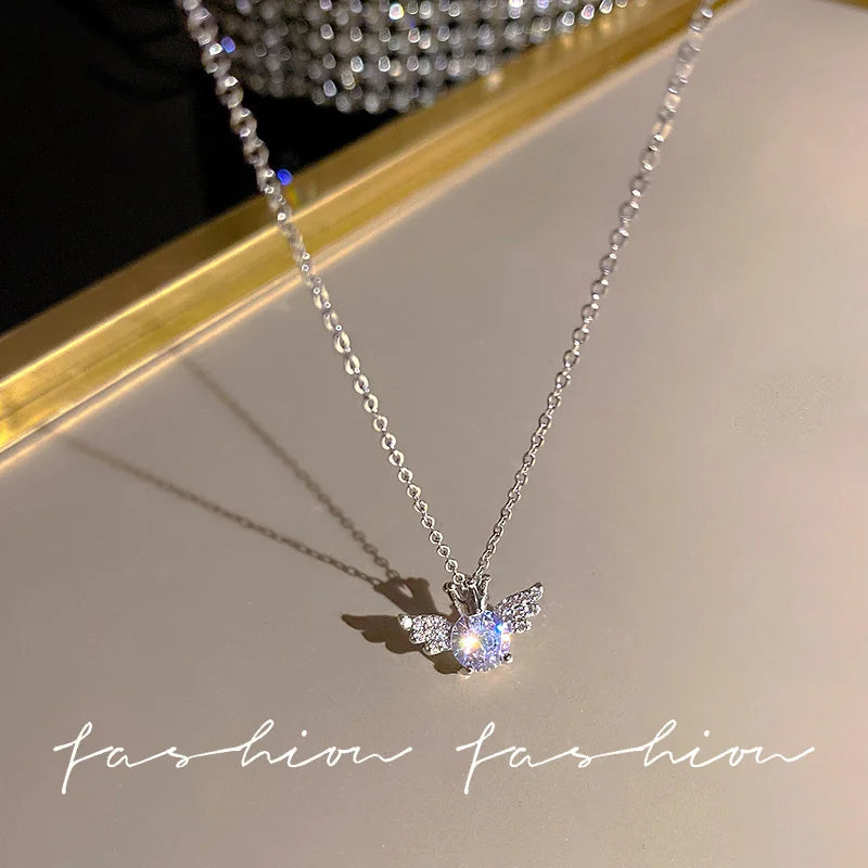 Crystal Bow, Angel Wings & Heart Necklace